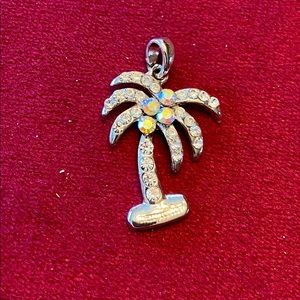 Palm tree pendant sparkly in used condition
